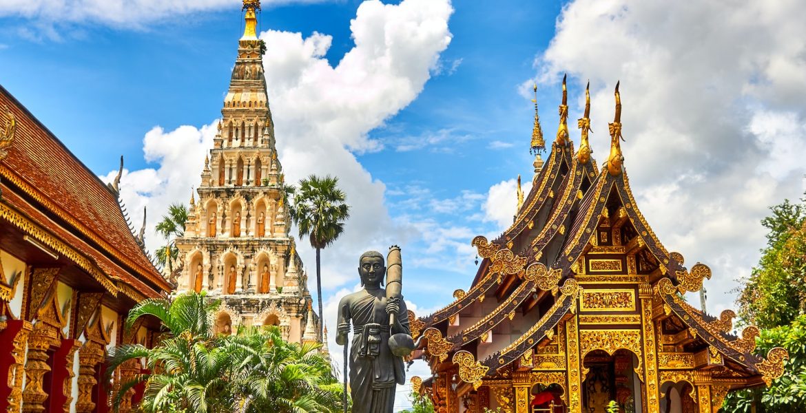 standing statue and temples landmark during daytime