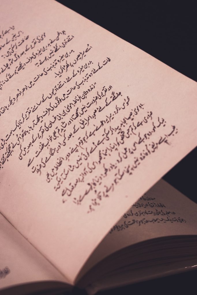 a close up of a book with writing on it